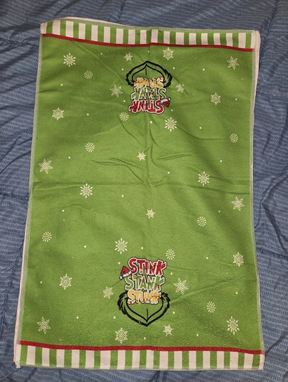 Two kitchen towels grinch